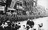 Troops marching in front of the Red Cross canteen on River Road, Newport News, Virginia